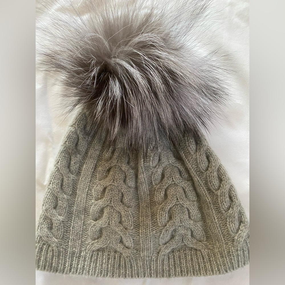 100% cashmere with silver fox fur,good condition.